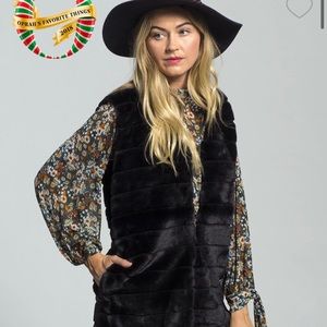 Echo faux fur vest with pockets.